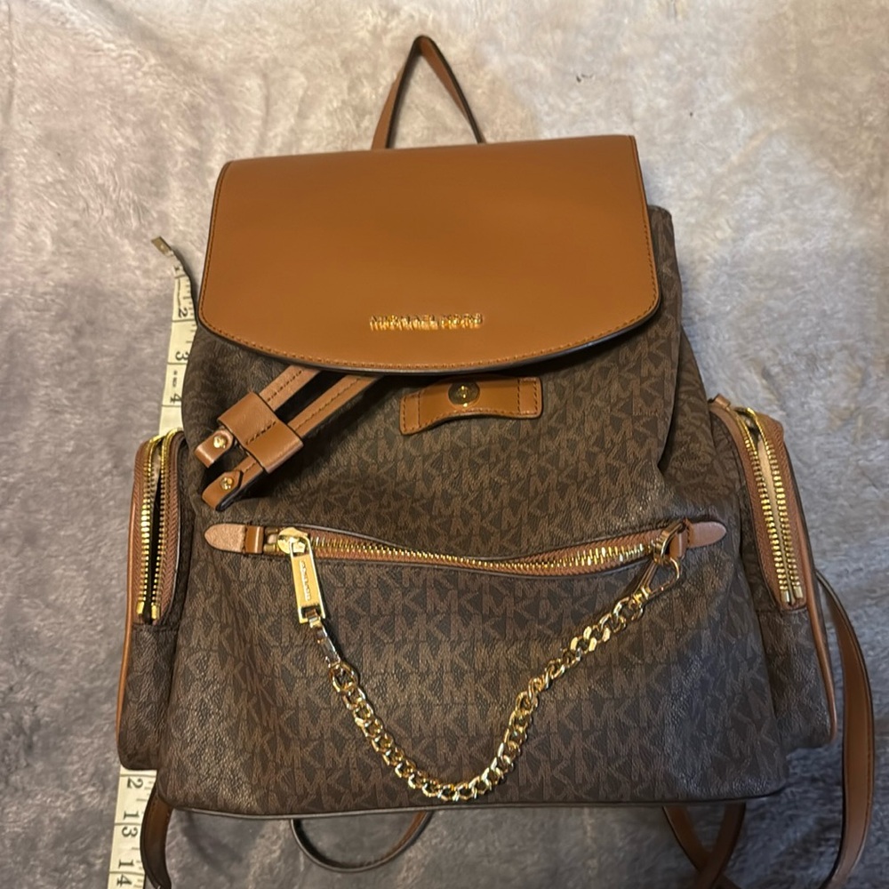 Jet Set Large Signature Logo Backpack. Brown with organizer insert.